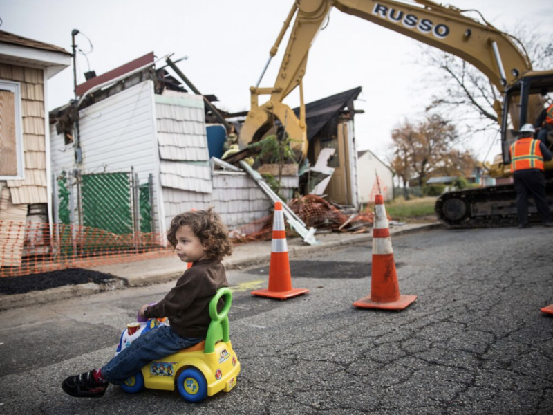A home on Staten Island’s Oakwood Beach is demolished in 2014.Photographer: Andrew Burton/Getty Images